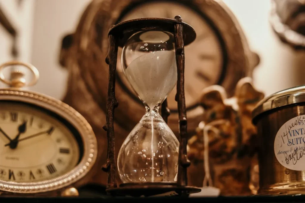 Shallow focus of a clear hourglass representing the importance of responding to bad reviews for restaurant quickly